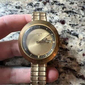 Vintage Elgin Ellipse mechanical hand wind Gold-Tone Round Face Wristwatch